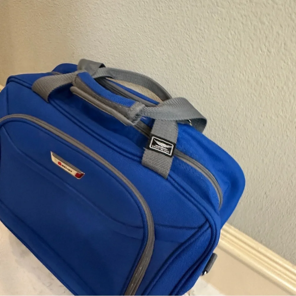 Delsey Underseat Carry On Rolling Tote Blue Softside Travel Bag